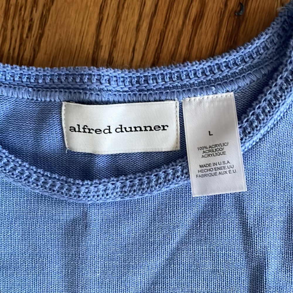 Brand new without tags light blue knit L sweater by Alfred Dunner